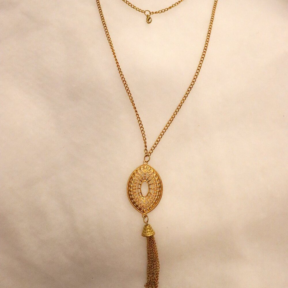 16" gold toned chain necklace with metal pendant and chain tassels, vintage styl